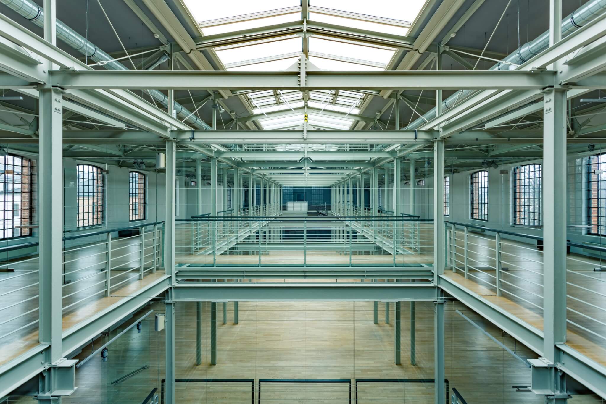 Warehouse or prison? Modern industrial interior with balustrades